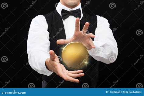 Close Up Of Magician With Golden Coin Over Black Stock Photo Image Of