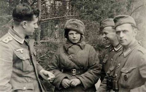 three german soldiers with captured red army women soldier date unknown [600x379] r