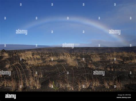 Rainbow Over The Crater Floor Stock Photo Alamy