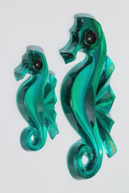 Using various combinations of resin, plastic, wood and metal, they are sensuous in texture and span the spectrum from opaque panels to translucent tiles. retro 60s aqua lucite plastic seahorses, vintage wall ...