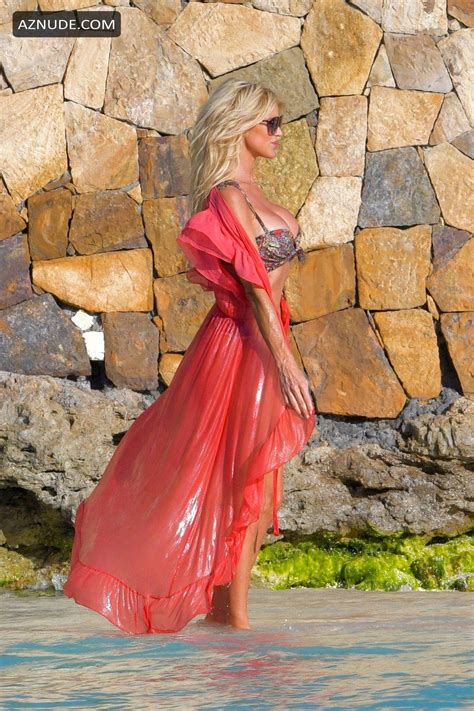 Victoria Silvstedt Flaunts Her Bronzed Figure As She Models A Bikini In