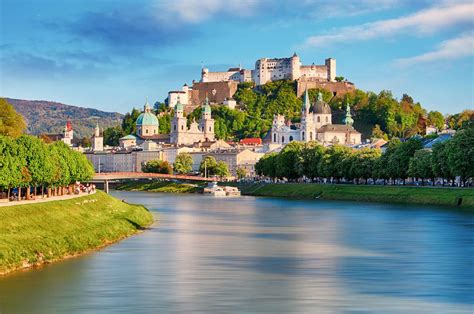 Panoramic View Of Salzburg Skyline With Festung Hohensalzburg And River