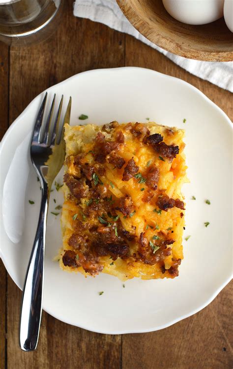 Add fresh tomatoes to the top this easy breakfast casserole with sausage and potatoes features frozen hash brown potatoes for. Overnight Hash Brown Casserole - Friday is Cake Night