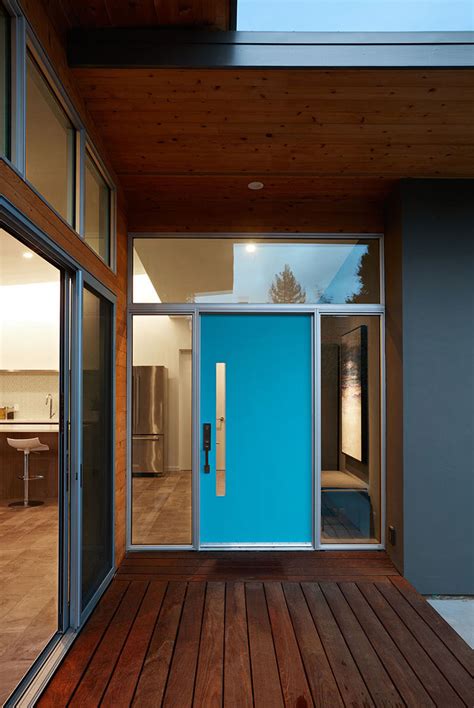 7 Examples Of Colorful Front Doors That Brighten Up These Modern Homes