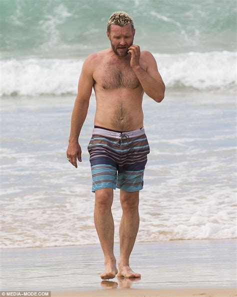 Joel Edgerton Shows Off His Muscular Bare Torso As He Enjoys A Swim