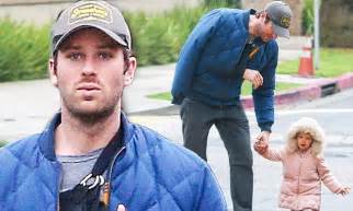 Armie Hammer Adorably Plays In A Puddle With Daughter Daily Mail Online