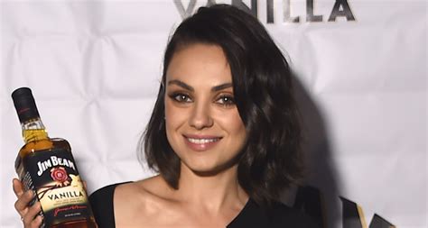 Mila kunis' brunette, romantic, wavy, updo hairstyle makes gorgeous waves look stunning with a glossy finish. Mila Kunis debuts a short bob hairstyle | WHO Magazine