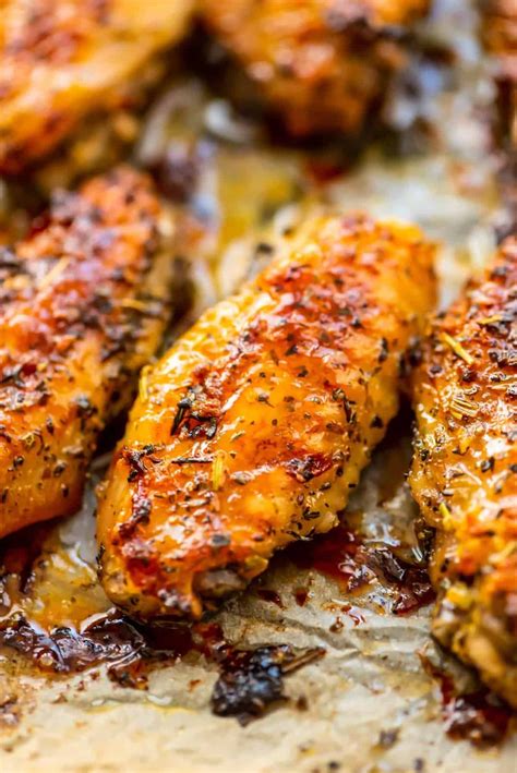 These tasty wings are boiled, dried, and then baked in the oven. Garlic and Herb Baked Chicken Wings - Easy Chicken Recipes (VIDEO!!) | Recipe in 2020 | Baked ...