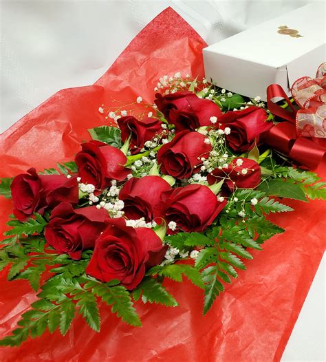 One Dozen Red Roses Boxed With Babies Breath In Poughkeepsie Ny