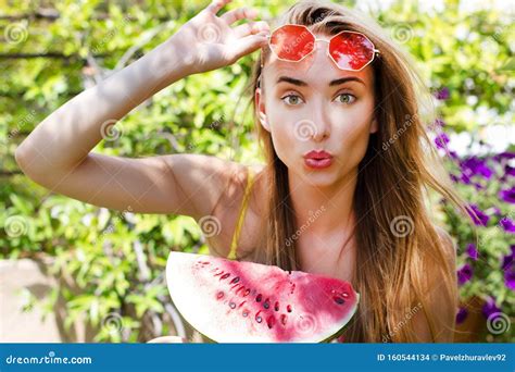 Beauty Model With Watermelon Enjoy Her Vacation In Flower Tropical Garden Beautiful Woman With