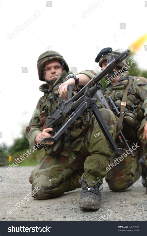 Soldiers Firing Machine Gun Stock Photo 19675984 Shutterstock