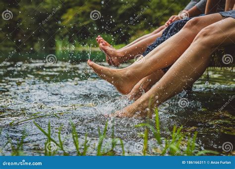 women splashing feet in water stock image image of bathing pond 186166311