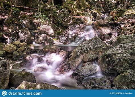 Beautiful Waterfall In Autumn Forest In Crimean Mountains Stones With