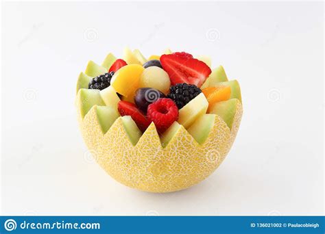Fancy Cut Melon On A White Background With Assorted Fruit
