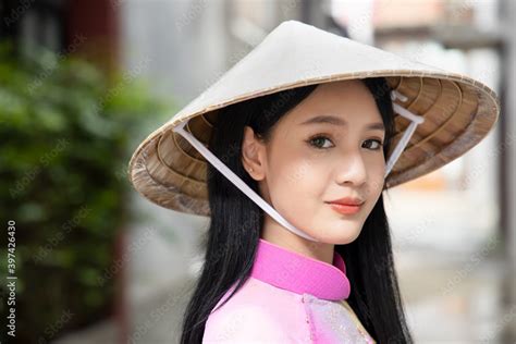 Happy Smiling Vietnamese Girl Portrait Of Exotic Asian Vietnam Woman In Traditional Vietnamese