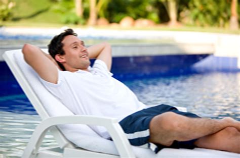 Man Relaxing In Pool Chair Copy Hayward Poolside Blog