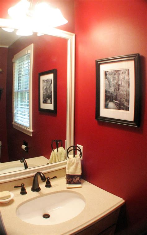 Deep purple walls wrap this bathroom in bold color. Favorite Paint Colors: Red Delicious