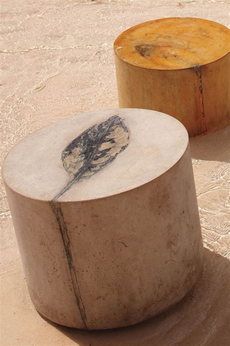 leaf imprinted cement stools for the garden