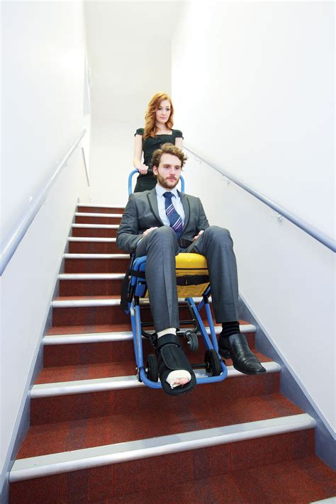 Evaculife carry evacuation chair has alloy aluminium lightweight framing and the specially designed friction belt means you can easily and safely transport individuals downstairs and has additional handles to carry people upstairs. Iconic Ellis Island chooses EVAC CHAIR® | Spin Digit
