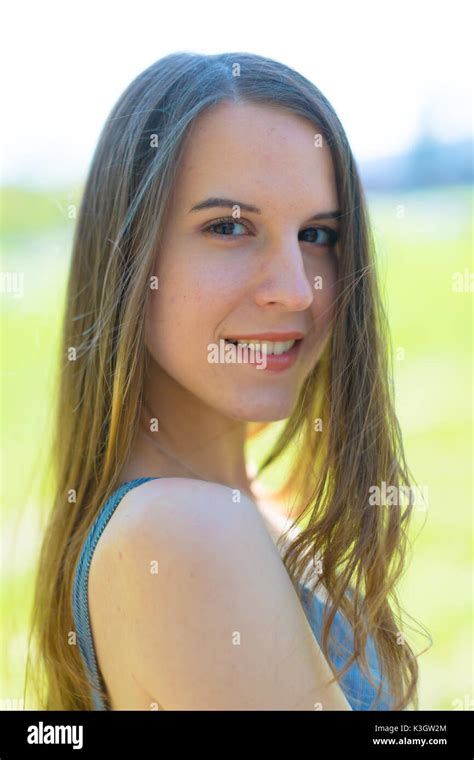 Head Outdoor Portrait Of A Slim Girl With Long Hair In The Nature Stock