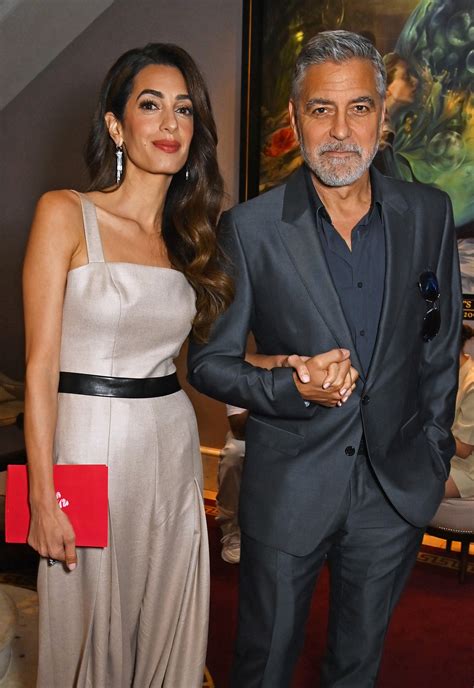 Amal Clooney Makes A Rare Red Carpet Appearance With George And Her