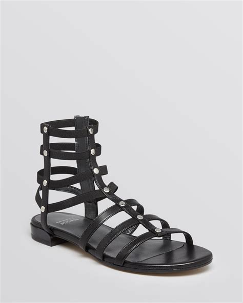stuart weitzman flat gladiator sandals caesar in black lyst