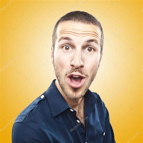 Portrait Of A Young Beautiful Man Surprised Face Expression Stock Photo