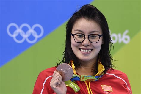 Chinese Olympic Swimmer Fu Yuanhui Tells The Whole World She S On Her Period Teen Vogue