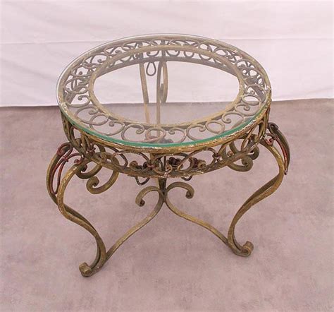 The phrase wrought iron furniture immediately creates an image of romantic elegance and rustic charm, and a wrought iron coffee table can certainly give a country or vintage living room a touch of upscale, antique class. Side Table Round Coffee Glass Top Wrought Iron circa 1900 ...