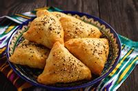 In place means (a) in the proper or usual place: SAMOSA | meaning in the Cambridge English Dictionary