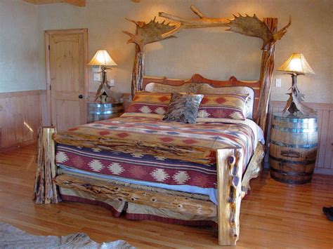 rustic log bed with brindle cowhide headboard and moose antler rustic bedroom nashville