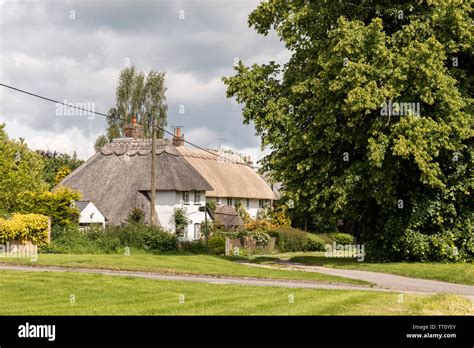 Pretty Thatched Cottages In The Village Of East Grafton Wiltshire