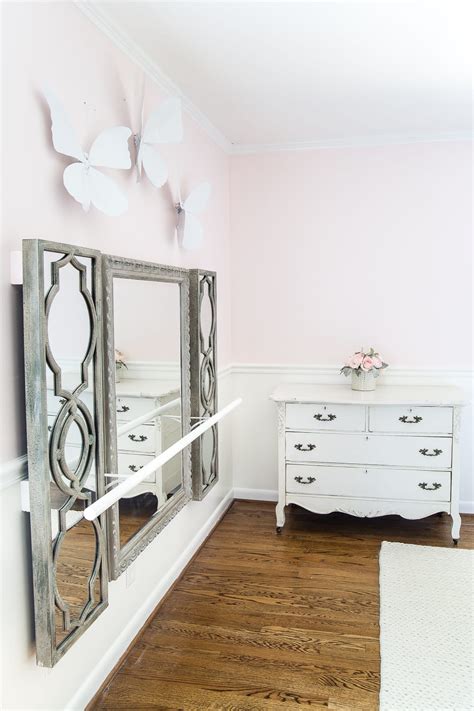 Paint it your favorite color, add some rhinestones, put your name on it! DIY Ballet Barre and How to Hang Wall Decor on a Chair Rail - Bless'er House