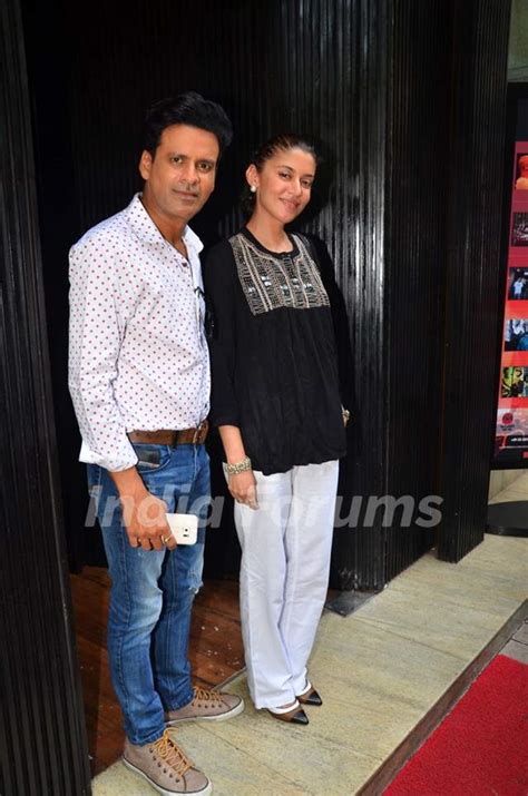 manoj bajpayee with wife neha at special premiere of film kriti photo