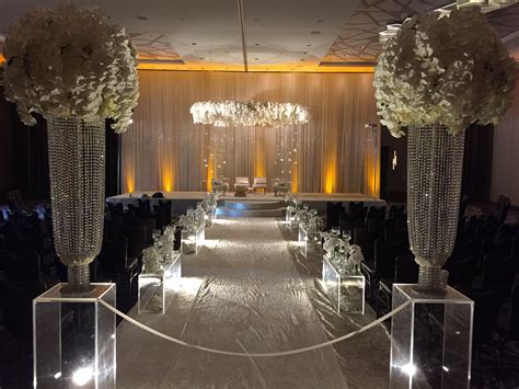 Wedding Ceremony Decor With High Floral Centerpieces With Crystals