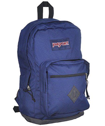 A Blue Backpack With The Word Jansport On Its Front And Side Pockets
