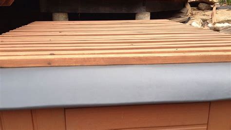 The cover can add years to the life of the hot tub, and once it's set up, you get a private and personal space to enjoy the warmth of your hot tub. DIY Rollable Cedar Hot Tub Spa Cover | Hometalk