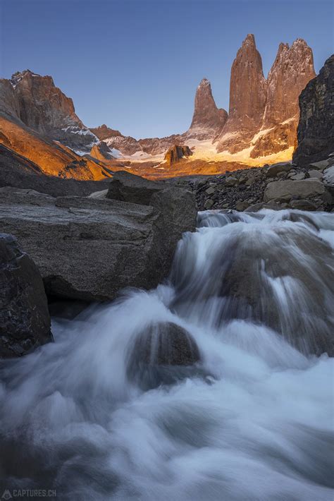 Waterfall And The Towers At Sunrise Torres Del Paine Flickr