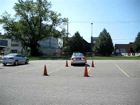The maneuverability test will examine your ability to move and handle your car in a 9' by 20' box outlined with markers or cones. Melissa Practicing Maneuverability - YouTube