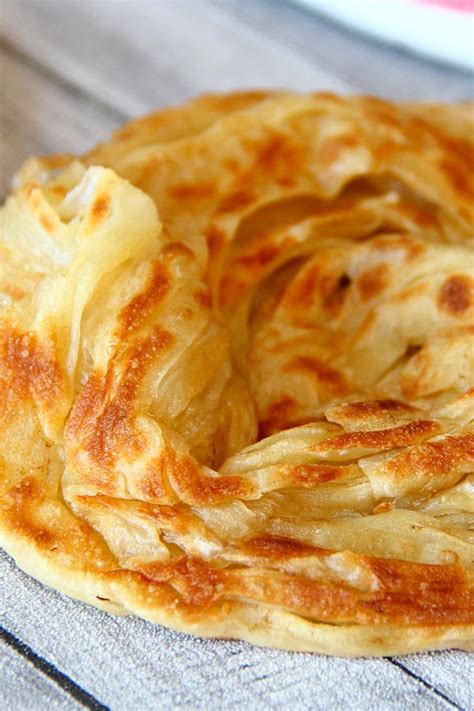 How To Make Roti Canai El Mundo Eats Paratha Recipes Roti Canai