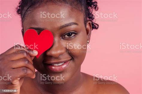 Dark Skin Lady Showing Two Paper Card Heart Shape Figure Form Lovely