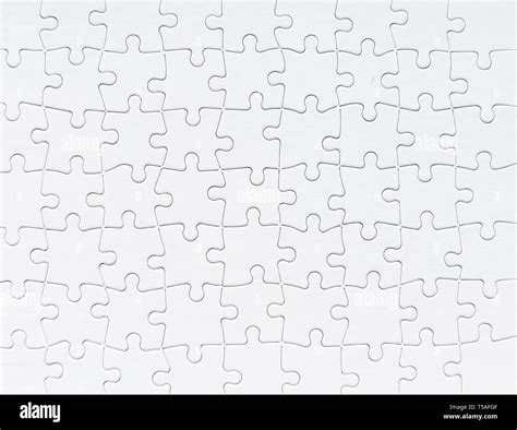 White Jigsaw Puzzle Background Stock Photo Alamy