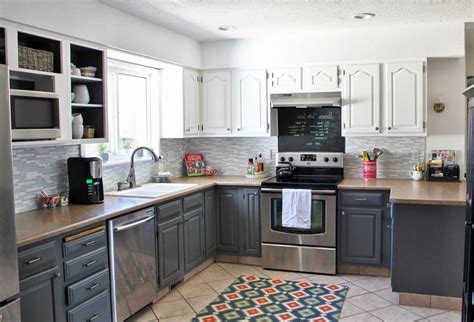 Natural dark wood kitchen cabinets with gray granite waterfall countertop. Grey Wood Kitchen Cabinets Design With Brown Granite and ...