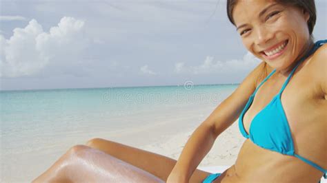Beach Suntan Bikini Woman Applying Sunscreen Spf Lotion On Stomach