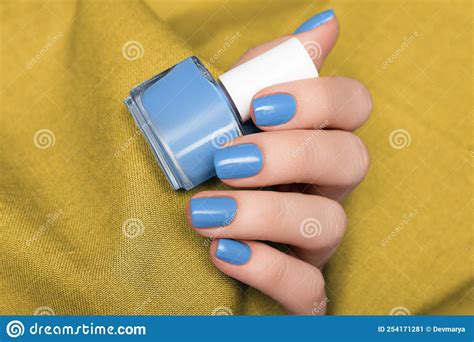 Female Hand With Blue Nail Design Glitter Blue Nail Polish Manicure Stock Image Image Of Blue