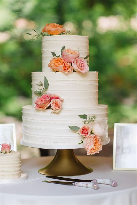 Simple Frosted Cake With Peach And Pink Blooms Beautiful Cake Designs