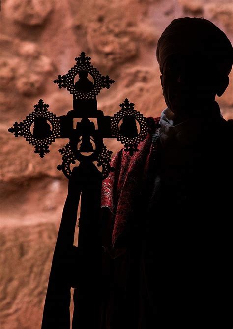 Silhouette Of An Ethiopian Orthodox Priest Holding A Cross Amhara