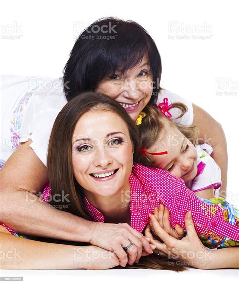 Young Woman Her Mother And Daughter Stock Photo Download Image Now