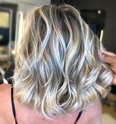 Bob haircuts, in particular, look ravishing when you add blonde streaks to a brown base. Ash Brown Wavy Lob With Blonde Highlights in 2020 | Medium ...