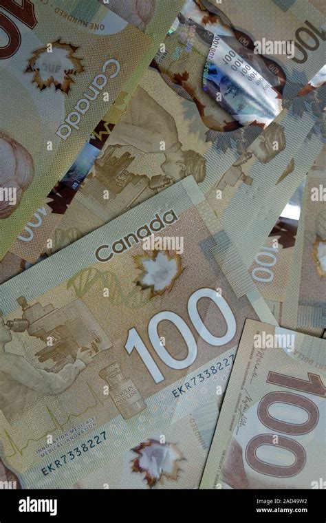 Stack Canadian 100 Dollar Bills Hi Res Stock Photography And Images Alamy